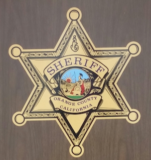 art_1485_-_oc_sheriffs_badge_symbol.jpg