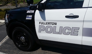 dui_summ_176_-_front_left_panel_of_fullerton_pd_car.jpg